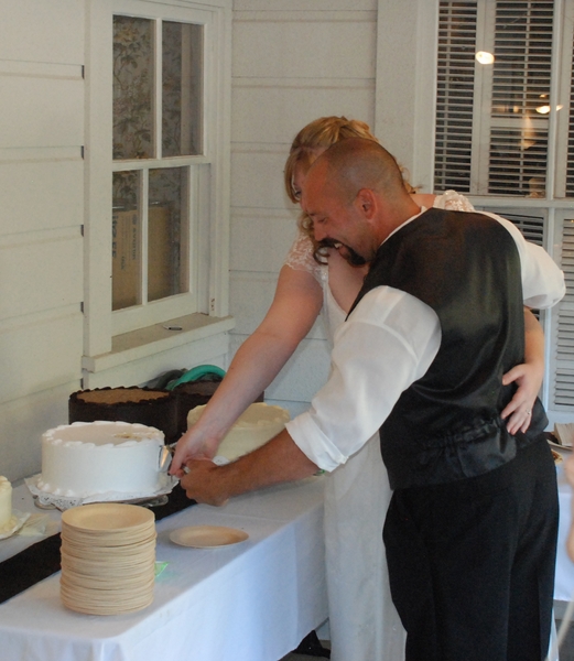 2009_10_24 Amy & Ray's Wedding_45 - Cake Cutting Cropped.jpg